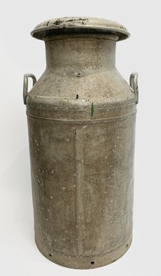 Lot 525 - An aluminium 10 gallon milk churn, engraved...