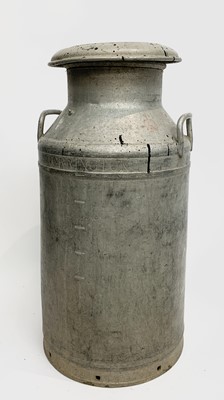 Lot 525 - An aluminium 10 gallon milk churn, engraved...