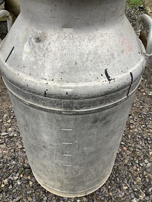 Lot 525 - An aluminium 10 gallon milk churn, engraved...