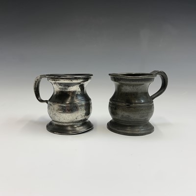 Lot 598 - Three pewter candle wall sconces, height 27cm,...