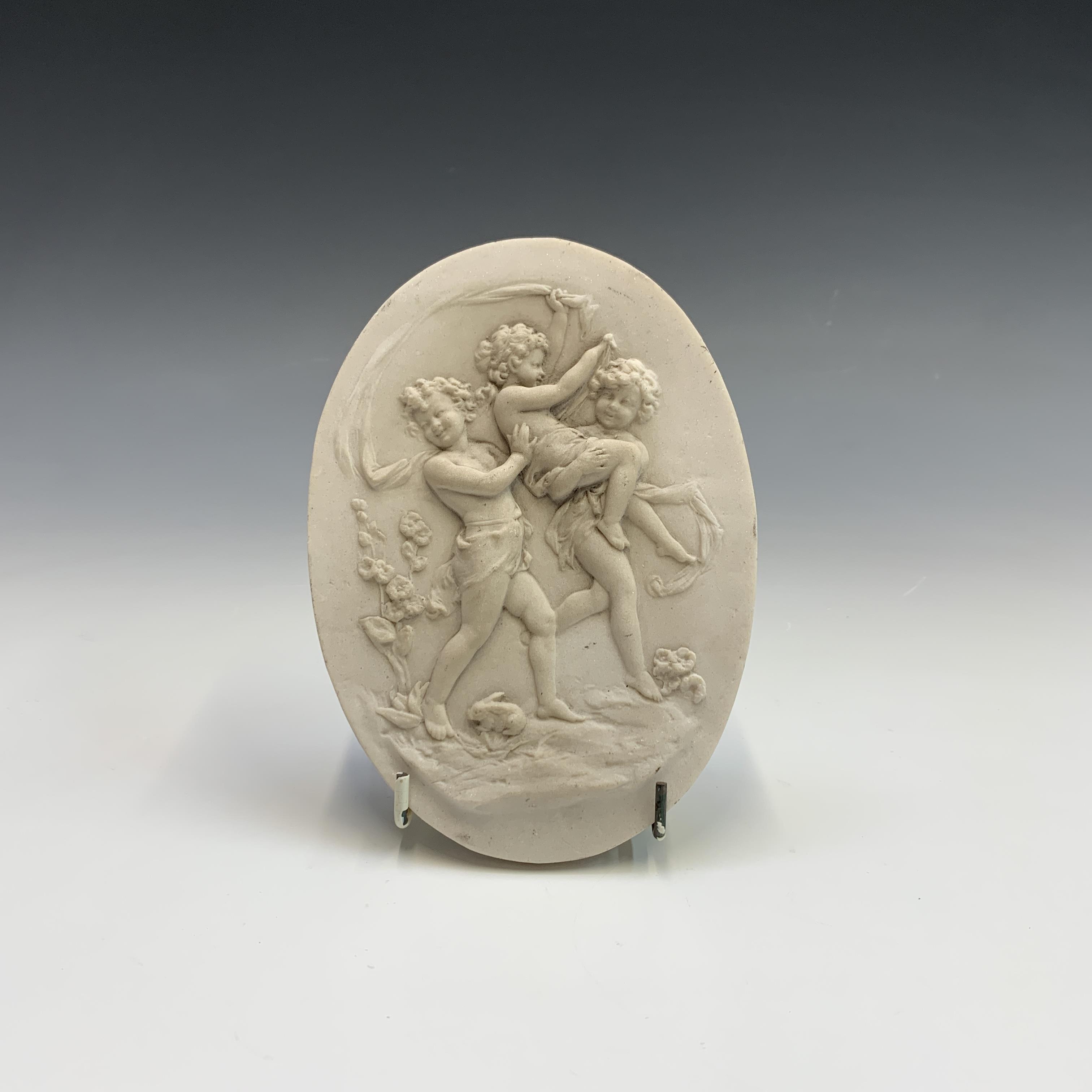 Lot 546 Two reconstituted marble plaques decorated