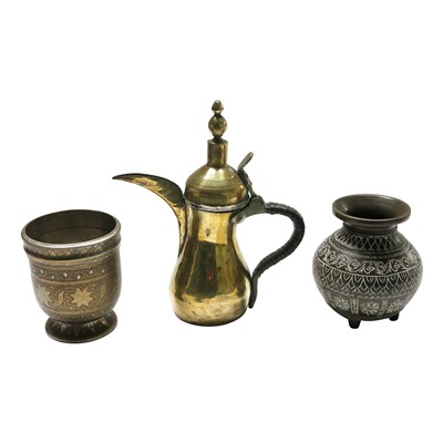 Lot 714 - An early 20th century brass dallah pot, height...