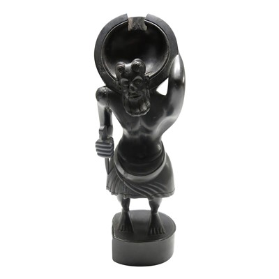 Lot 718 - An Indo-Portuguese ebony figural watch stand,...