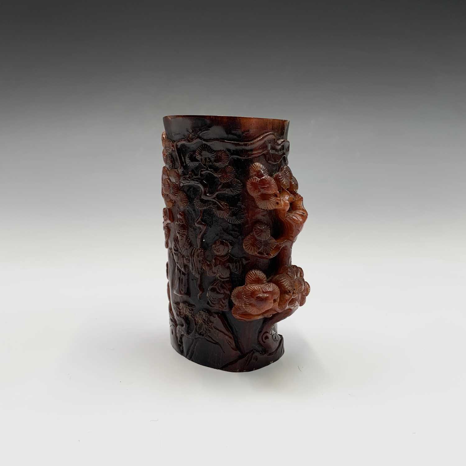 Lot 38 - A Chinese carved horn brush pot, height 11.5cm.