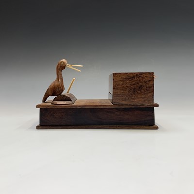 Lot 291 - A Japanese wood novelty cigarette dispenser,...