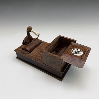 Lot 291 - A Japanese wood novelty cigarette dispenser,...