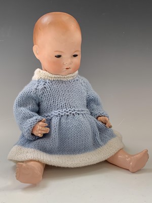 Lot 761 - German Porcelain Faced Doll - An attractive...