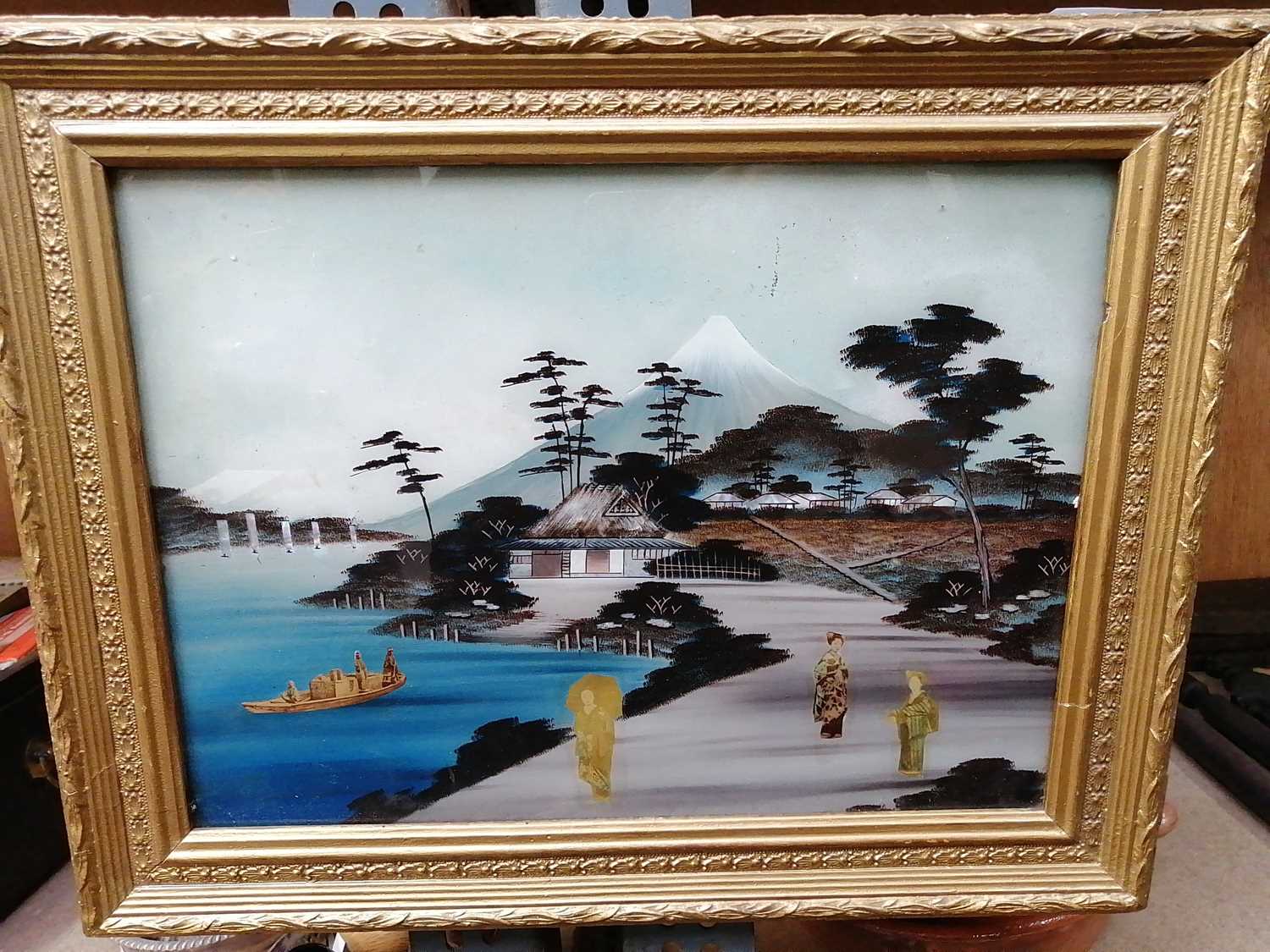 Lot 28 • A framed Asian scene with mother of pearl