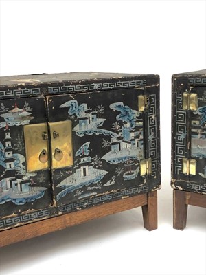 Lot 179 - A pair of Chinese lacquered wood and painted...
