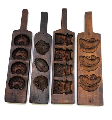 Lot 98 - Four 20th century carved treen gingerbread...