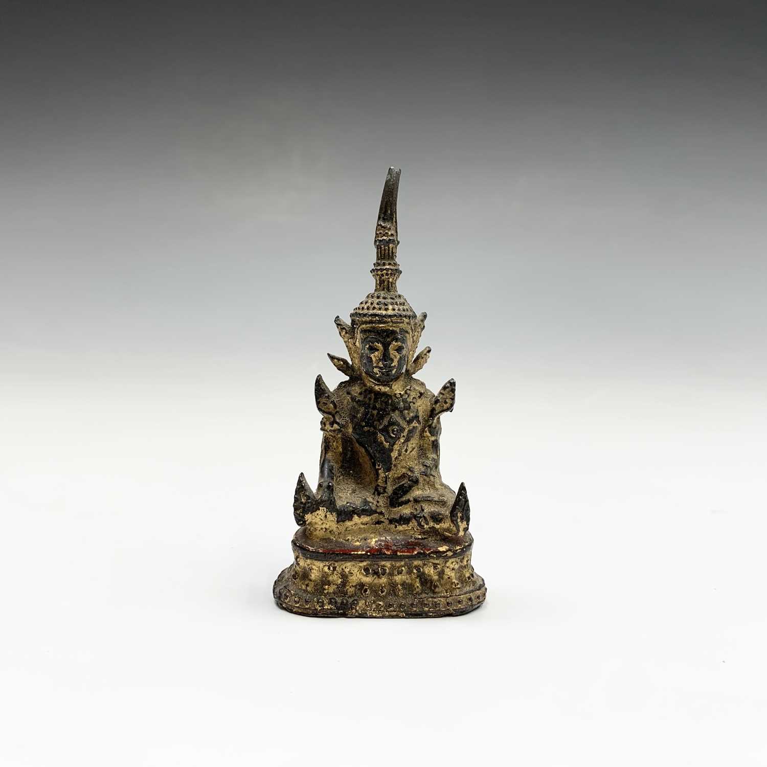 Lot 431 - An early Indian miniature gilt bronze figure...