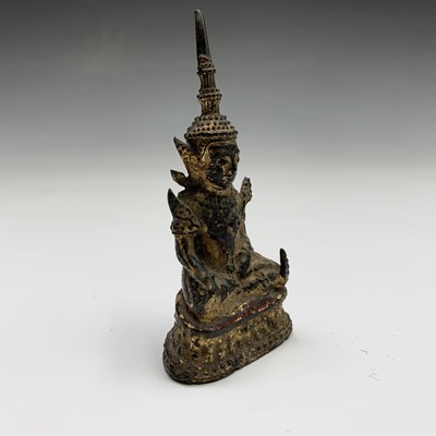 Lot 431 - An early Indian miniature gilt bronze figure...