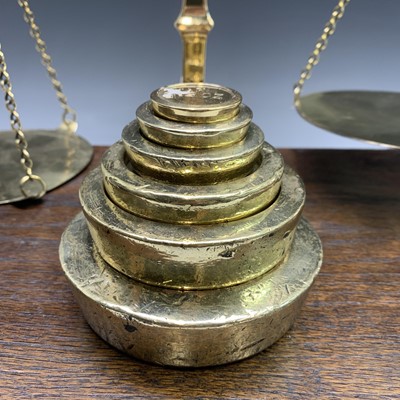 Lot 486 - A set of 19th century brass beam scales,...