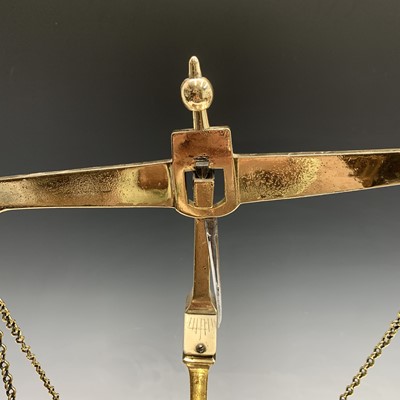 Lot 486 - A set of 19th century brass beam scales,...