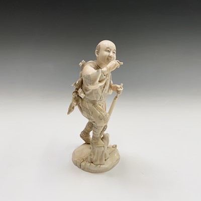Lot 201 - A Japanese ivory figure of a hunter, Meiji...