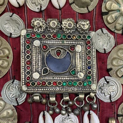 Lot 433 - A Central Asian headdress, with metal mounts...