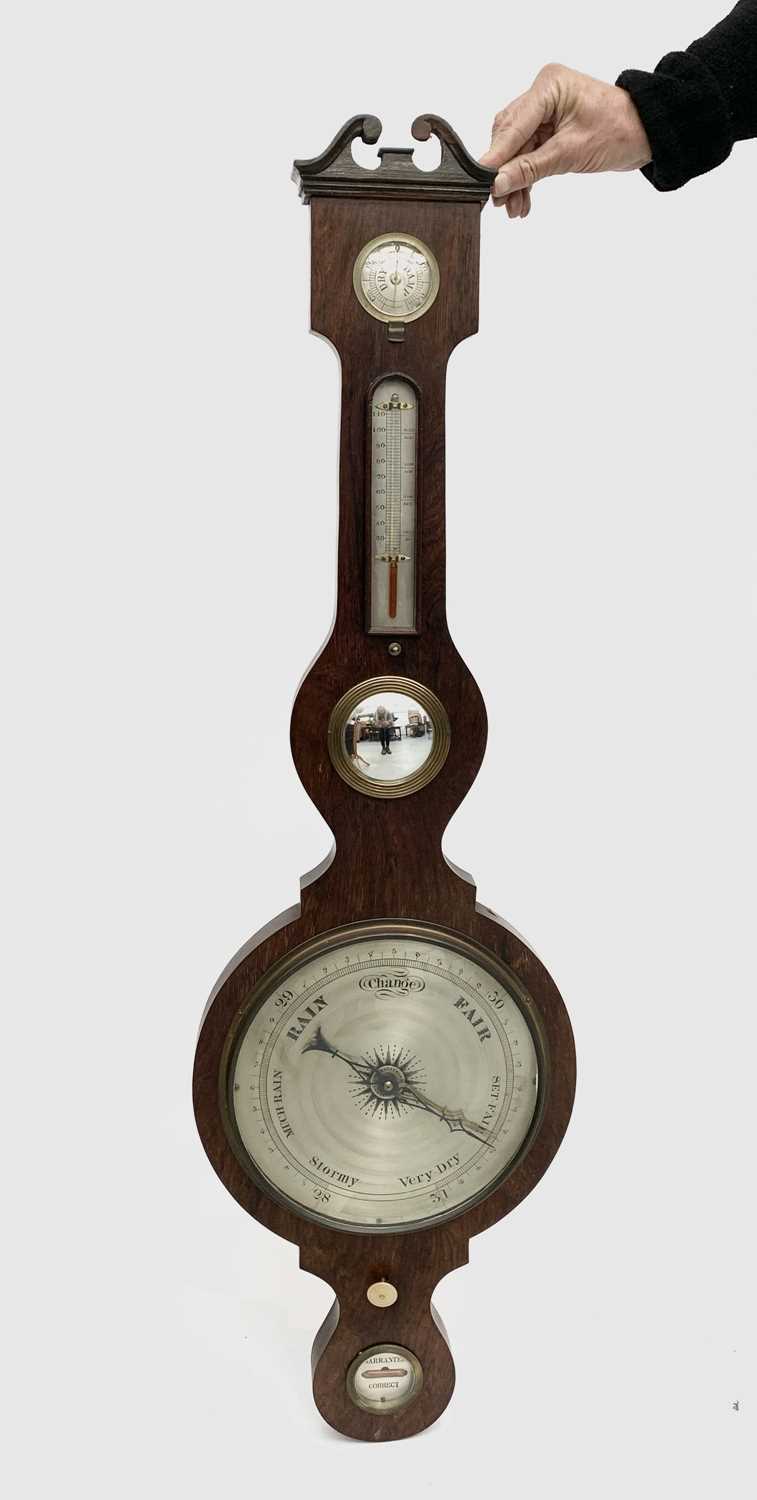 Lot 2912 - A Victorian rosewood wheel barometer with