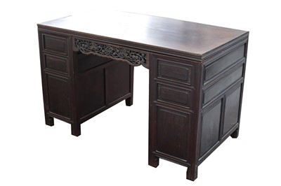 Lot 100 - A Chinese hardwood twin pedestal desk, late...