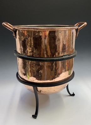 Lot 471 - A Victorian twin handled copper cauldron or...