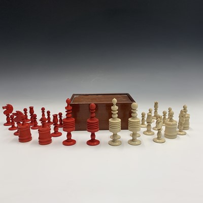 Lot 458 - A late 19th century turned bone chess set,...