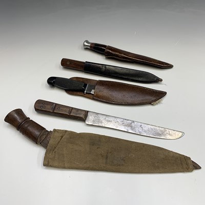 Lot 461 - A sheath knife, the blade stamped G Wostenholm...