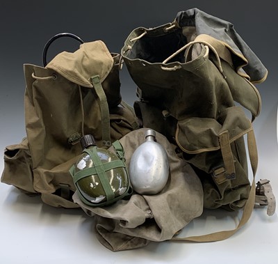 Lot 463 - A Bukta canvas backpack, another army backpack,...