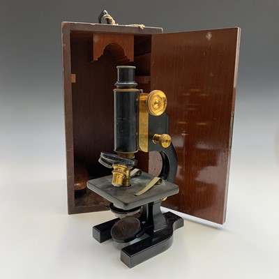 Lot 492 - A black lacquered brass microscope, by Belcher...