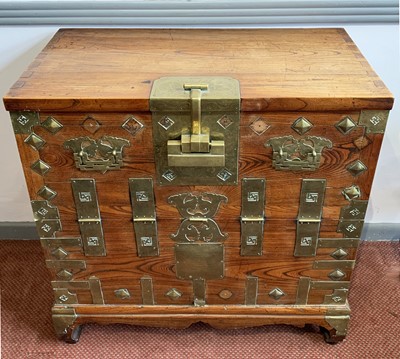 Lot 100 - A Chinese elm chest, late 18th/early 19th...