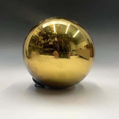 Lot 643 - A gold mirrored glass witch ball. Diameter...