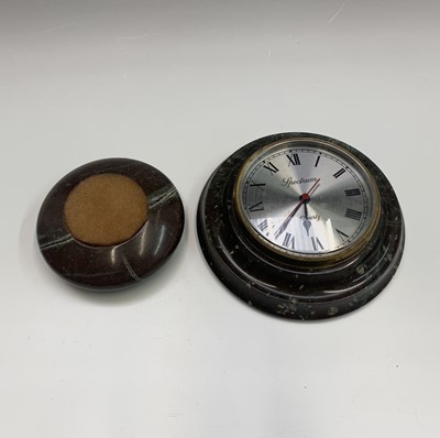 Lot 644 - A wall clock in circular turned serpentine...