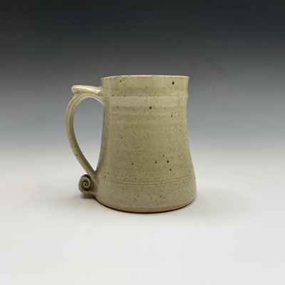 Lot 1083 - A Leach studio pottery mug, the handle with...