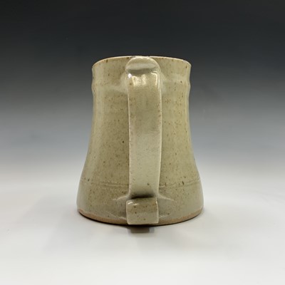 Lot 1083 - A Leach studio pottery mug, the handle with...