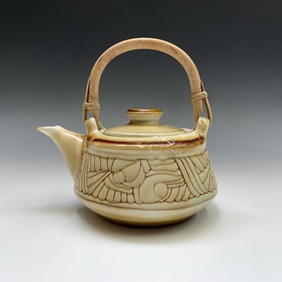 Lot 1078 - A Celtic Pottery teapot and cover, width 21cm,...