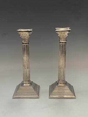 Lot 155 - A pair of filled silver classical column...