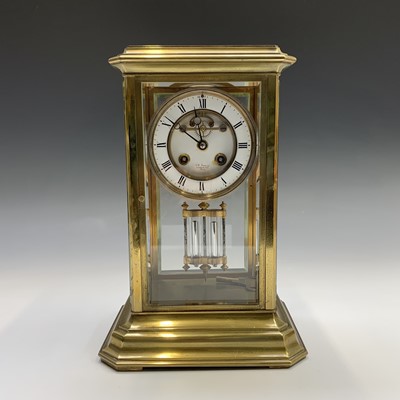 Lot 2938 - A four glass brass mantel clock, the two part...