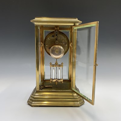 Lot 2938 - A four glass brass mantel clock, the two part...