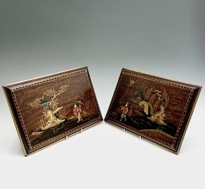 Lot 191 - A pair of chinoiserie wood rectangular  panels,...