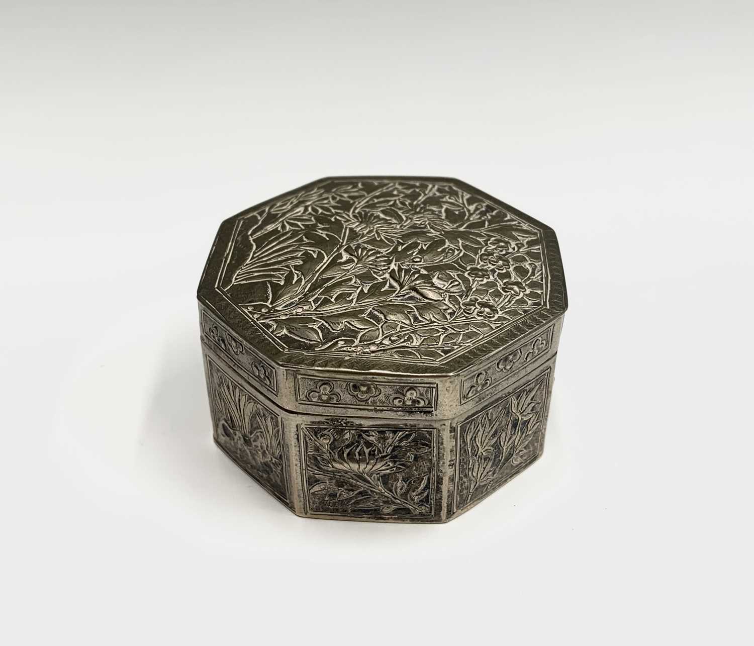 Lot 91 - A Chinese silver octagonal box, with foliate