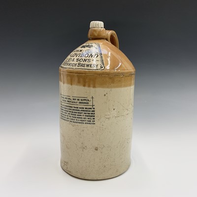 Lot 585 - A stoneware flagon inscribed 'John Lovidond &...