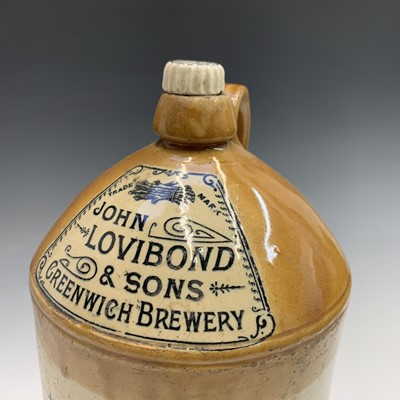 Lot 585 - A stoneware flagon inscribed 'John Lovidond &...