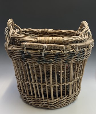 Lot 535 - Two Newlyn wicker fish baskets, one with corks...