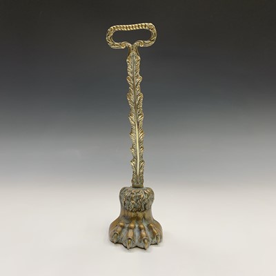 Lot 544 - A 19th century brass doorstop, cast as a...