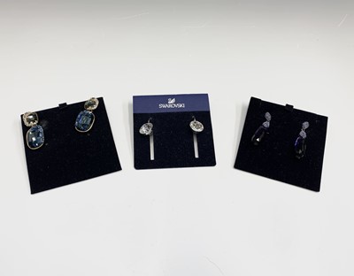 Lot 631 - Three pairs of Swarovski Crystal earrings in...