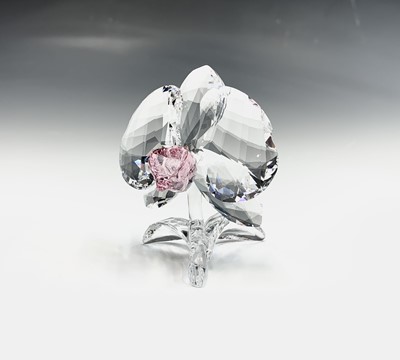 Lot 239 - Swarovski Crystal - an orchid ornament, height...