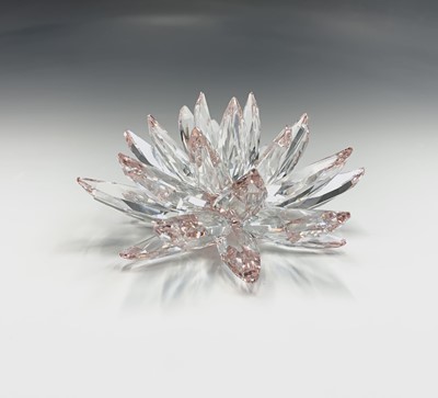 Lot 239 - Swarovski Crystal - an orchid ornament, height...