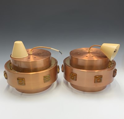 Lot 552 - A pair of 1970s copper finish hanging light...