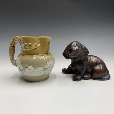 Lot 1049 - A studio pottery figure of a puppy,...