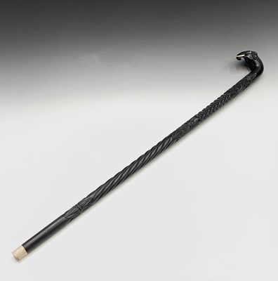 Lot 559 - An Indian ebony walking stick, circa 1900, the...