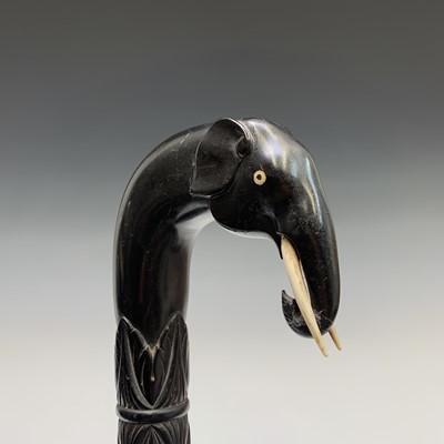 Lot 559 - An Indian ebony walking stick, circa 1900, the...