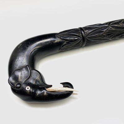 Lot 559 - An Indian ebony walking stick, circa 1900, the...